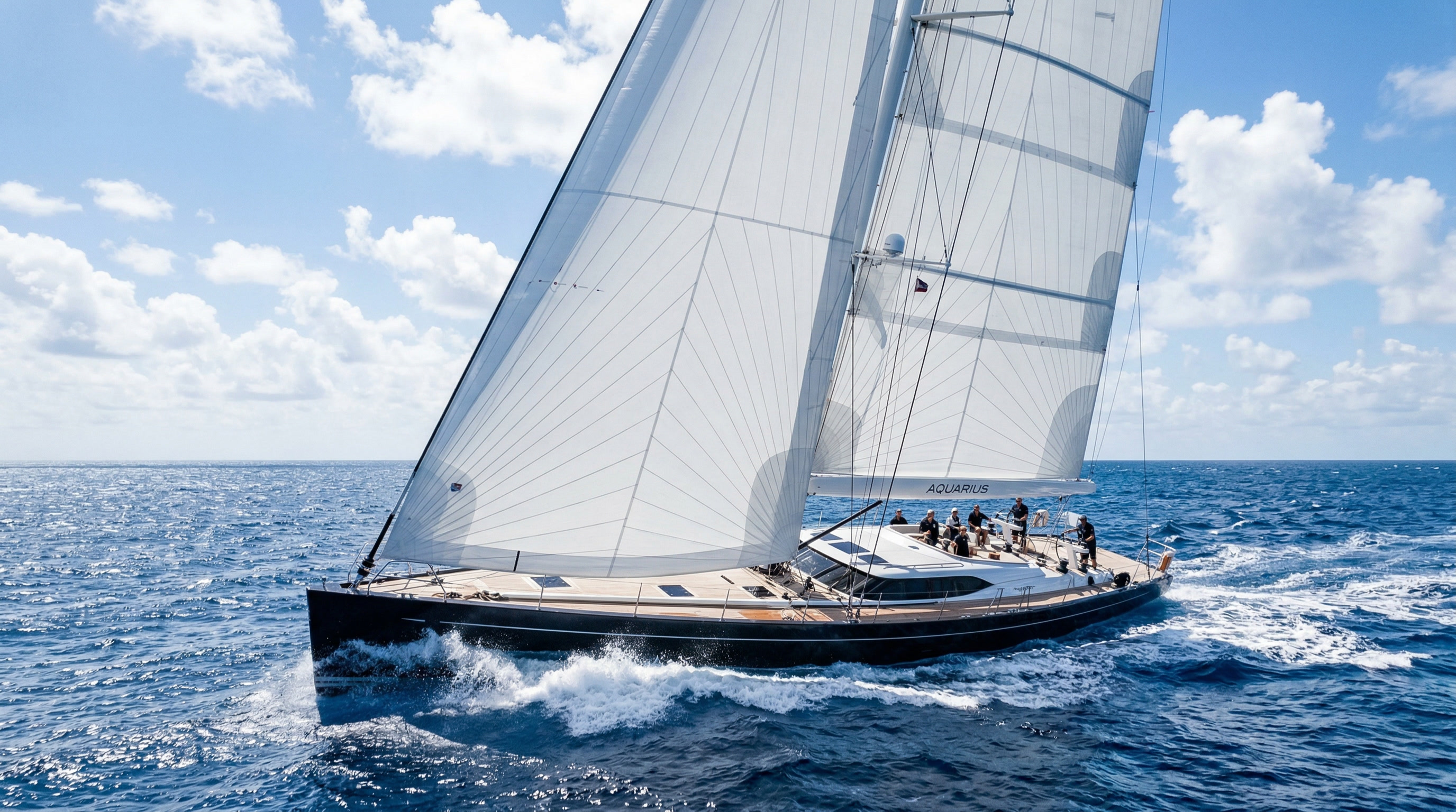 Luxury sailing yacht under full sail on the open sea